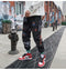 IMG 125 of Trendy Graffiti Casual Pants Men Korean Couple Loose Ankle-Length Hip-Hop ins Sporty Jogger Pants